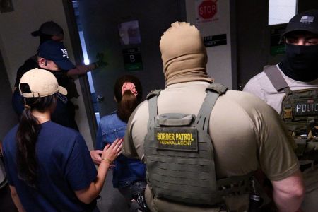 U.S. federal agents working for Immigration and Customs Enforcement (ICE) detain illegal immigrants and asylum seekers reporting for immigration court proceedings at the Jacob K. Javits Federal Building's U.S. Immigration Court in New York, New York, on July 24, 2025. 