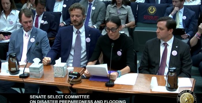 The family of 8-year-old Linnie McCown, one of the victims of the Camp Mystic flood, during the Texas Senate committee hearing.