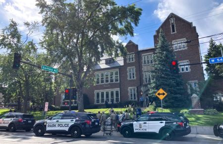 Police and first responders work at the scene of a shooting near Annunciation Church and Catholic School in Minneapolis, Minneosta, on August 27, 2025. US police responded Wednesday morning to a shooting at a Catholic school in Minneapolis, with officials saying that the shooter had been "contained." Local media, citing police sources, reported that the shooter was dead.