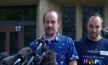 Jesse Merkel speaks with the press on Aug. 28, 2025, the day after a gunman killed his son, Fletcher, at Annunciation Catholic School in Minneapolis, Minnesota.,