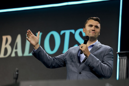 Charlie Kirk, who founded Turning Point USA, speaks before former President Donald Trump's arrival during a Turning Point USA Believers Summit conference at the Palm Beach Convention Center on July 26, 2024, in West Palm Beach, Florida. 