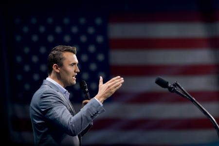 Charlie Kirk, who founded Turning Point USA, speaks before former President Donald Trump's arrival during a Turning Point USA Believers Summit conference at the Palm Beach Convention Center on July 26, 2024, in West Palm Beach, Florida.