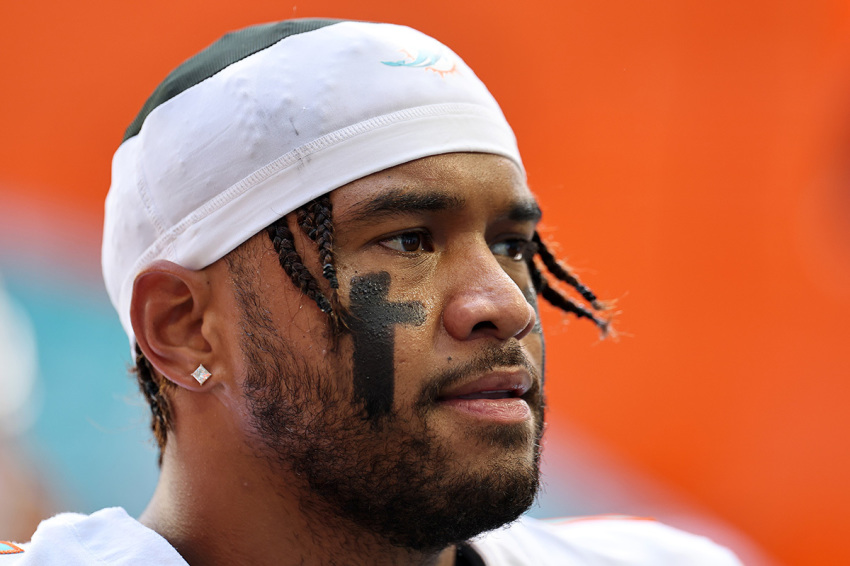 Tua Tagovailoa #1 of the Miami Dolphins warms up prior to the game against the New England Patriots at Hard Rock Stadium on Sept. 14, 2025, in Miami Gardens, Florida. 