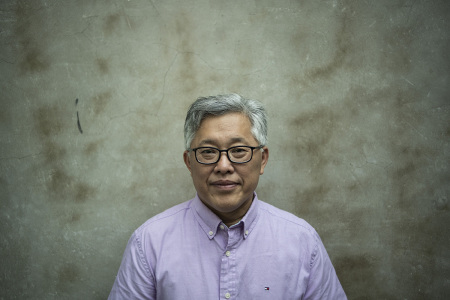 This photo taken on Sept. 12, 2018, shows Jin Mingri, head pastor of the Zion church, posing in Beijing days after authorities shut down one of China's largest underground Protestant churches. A Chinese Protestant pastor is vowing to keep preaching to his flock despite the closure of his prominent underground church in Beijing, defying the government's intensifying pressure on religious groups.