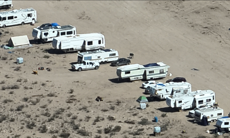 Texas Attorney General Ken Paxton alleges the West Texas property lacks sewer access, septic systems, running water, and has a "burn pit" dug in the ground to dispose of trash and human waste.