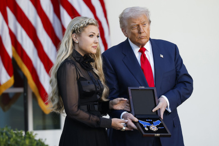 U.S. President Donald Trump posthumously awards the Presidential Medal of Freedom to late conservative Christian activist Charlie Kirk as he presents the Medal to his wife Erika Kirk (L) during a ceremony in the Rose Garden of the White House on Oct. 14, 2025, in Washington, D.C. Today marks the National Day of Remembrance for Charlie Kirk who was shot and killed on September 10th at Utah Valley University.