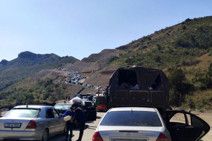 Armenians fleeing Nagorno-Karabakh (Republic of Artsakh) sit in a long traffic jam of vehicles along the Lachin corridor on Sept. 28, 2023, after Azerbaijan's lightning offensive crushed the region's de-facto independence.