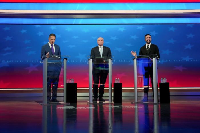 Democratic nominee Zohran Mamdani (R) speaks alongside Independent nominee former New York Gov. Andrew Cuomo (L) and Republican nominee Curtis Sliwa during a mayoral debate at Rockefeller Center on October 16, 2025 in New York City. The candidates for New York City mayor are facing off in their first debate ahead of the November 4 election. 
