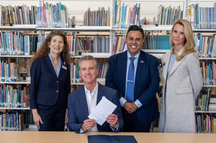 California Gov. Gavin Newsom marks the signing of AB 727 on Oct. 10, 2025.