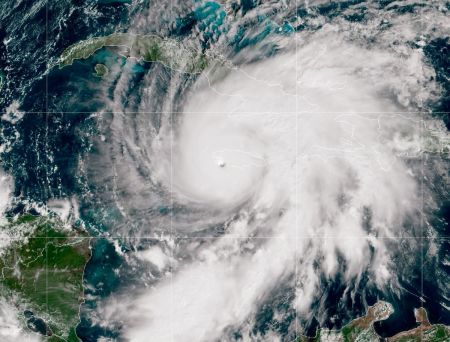 In this handout satellite image provided by the National Oceanic and Atmospheric Administration (NOAA), Hurricane Melissa churns through the Caribbean Sea, captured at 15:20Z on October 28, 2025. Hurricane Melissa has intensified into a Category 5 storm as it approaches Jamaica, bringing torrential winds and rain, according to the National Hurricane Center. 