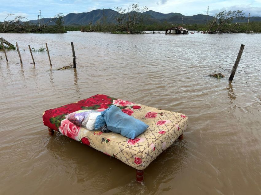 A bed washed away by floods is seen after the passage of Hurricane Melissa through the town of San Miguel de Parada in Santiago de Cuba province on October 29, 2025. A powerful Hurricane Melissa made landfall in eastern Cuba on Wednesday, causing damage and flooding to homes and streets in Santiago de Cuba province, an AFP team on the ground reported. 