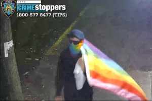Masked suspect vandalizes 3 NYC churches with 'anti-Christian' messages while carrying LGBT flag