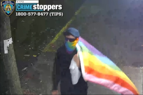 Masked suspect vandalizes 3 NYC churches with 'anti-Christian' messages while carrying LGBT flag