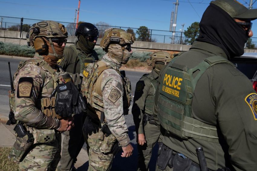 Federal agents search for undocumented immigrants on Nov. 17, 2025, in Charlotte, North Carolina. Federal agents are carrying out