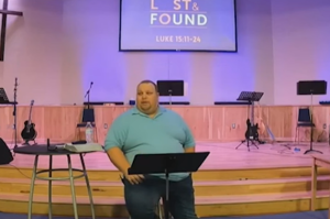 Bi-vocational pastor, real estate agent reinstated after $5K fine for 'hateful' comments on LGBT-themed coloring book 