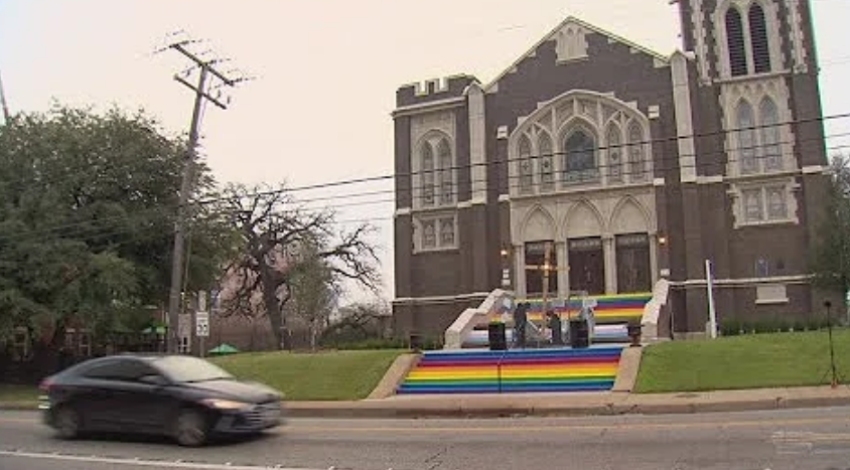 A screenshot of undated video footage showing the front entrance of Oak Lawn UMC in Dallas, Texas.