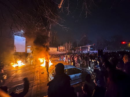 Iranians gather while blocking a street during a protest in Tehran, Iran on Jan. 9, 2026. The nationwide protests started in Tehran's Grand Bazaar against the failing economic policies in late December, which spread to universities and other cities, and included economic slogans, to political and anti-government ones.