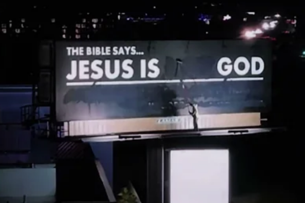 Man paints over heretical billboard to read 'Jesus is God' in viral video