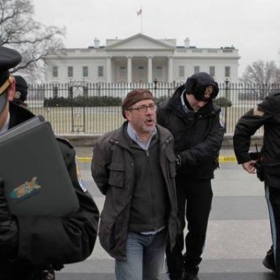 Rev. Patrick Mahoney, a Christian activist who says he has been involved in over 100 arrests, is handcuffed in front of the White House in Washington, D.C.