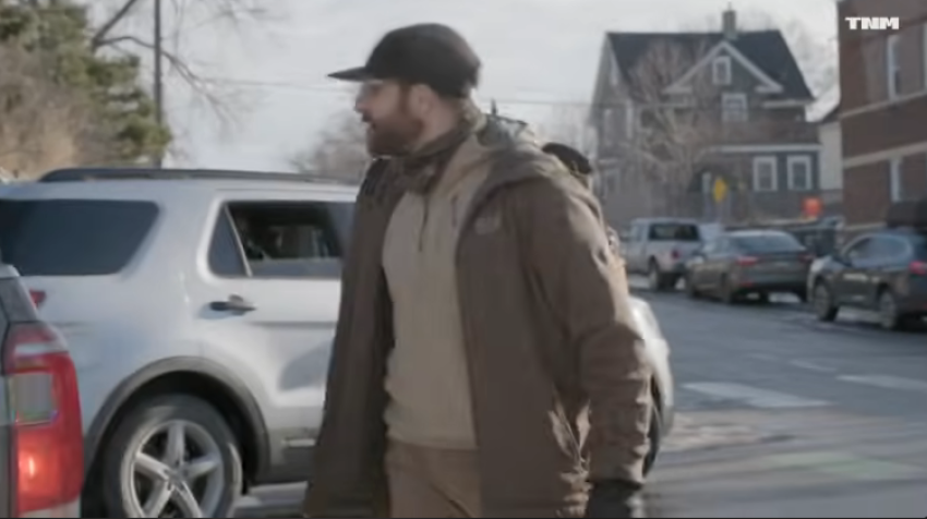 A man identified as Alex Pretti is seen in video footage from Jan. 13, 2026, breaking a taillight on a vehicle transporting Border Patrol officers.