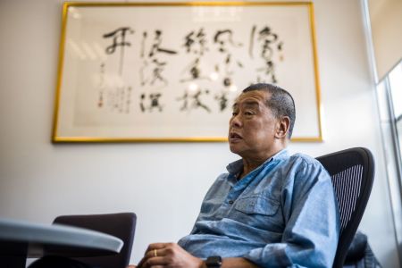 In this picture taken on June 16, 2020, media tycoon Jimmy Lai, 72, speaks during an interview with AFP at the Next Digital offices in Hong Kong. 