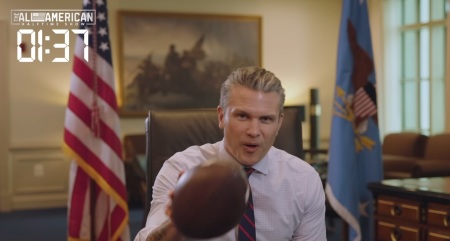 Secretary of Defense Pete Hegseth speaks during a video played during the Turning Point USA "All-American Halftime Show” on Feb. 8, 2026. 