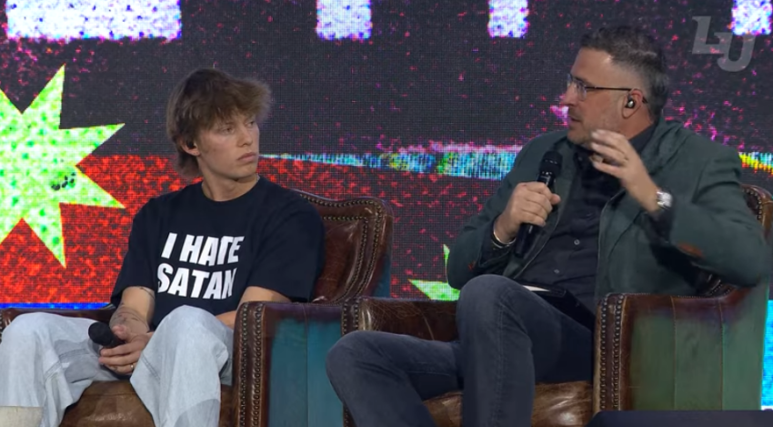 Christian content creator Bryce Crawford (left) and Pastor Jonathan Pokluda share the stage during Liberty University's Convocation event Wednesday.