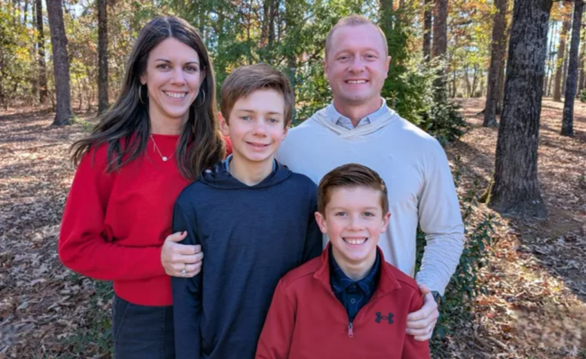 The late Jason Hughes (R), his wife Laura (L), and their two sons in happier times.