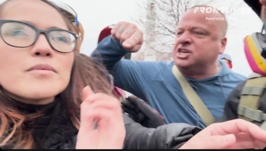 Turning Point USA contributor Savanah Hernandez is accosted by protesters in Minnesota on April 11, 2026.