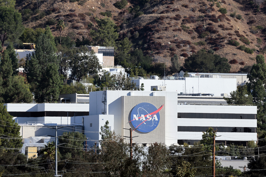The NASA logo is displayed at NASA’s Jet Propulsion Laboratory on Oct. 15, 2025, in La Cañada Flintridge, California. Around 550 people, or over ten percent of the famed lab’s workforce, are being laid off as part of an ongoing reorganization following two rounds of large layoffs last year. Layoffs at the laboratory, which is funded by NASA and managed by CalTech, are not related to the federal government shutdown. |