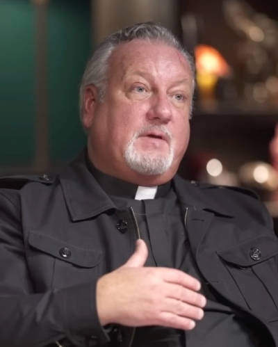 Fr. Dan Reehil, an exorcist with the Diocese of Nashville, appears during an episode of the
