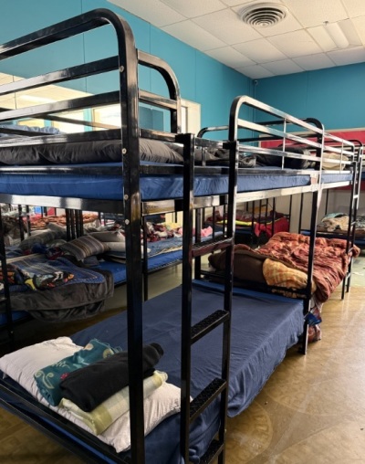 An indoor homeless shelter held at the parish hall at St. Paul’s By-the-Sea Episcopal Church of Ocean City, Maryland. The shelter was launched in March 2026 when local officials demanded that they move their outdoor homeless tent encampment.