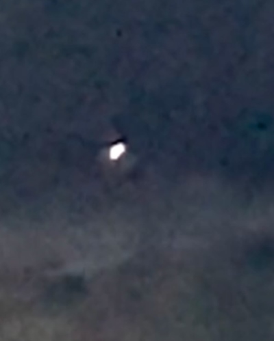 A screenshot from the "Orbs Over the Pond" video, which taken by a civilian in October 2024 in the northeastern U.S.