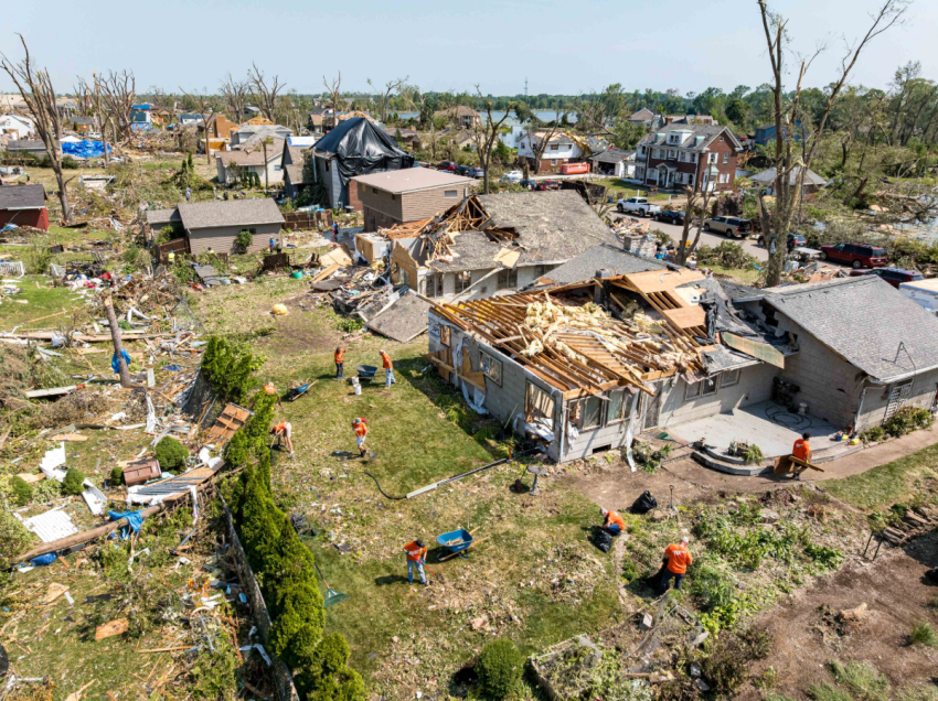 Samaritan's Purse volunteers help clean up after a tornado inflicts damage on several Wisconsin communities, including Appleton.