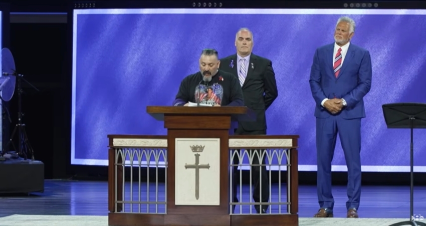 Alfredo Munoz, the uncle of fallen Army soldier Pfc. Isabella Gonzalez, speaks on stage during a memorial service at Prestonwood Baptist Church in Plano, Texas on Aug. 1, 2026. 