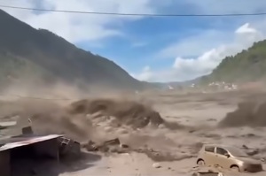 Nepali churches reach cut-off valleys by mountain bike as Himalayan floods leave hundreds dead