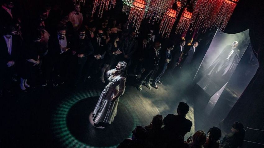 The Phantom and Christine perform before an audience in 