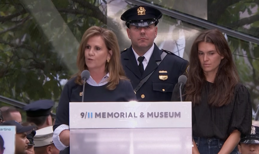 Terry Strada (L), a prominent advocate and the National Chair of 9/11 Families United, speaks at the 25th anniversary of the 9/11 Memorial in Lower Manhattan, N.Y., on September 11, 2026.