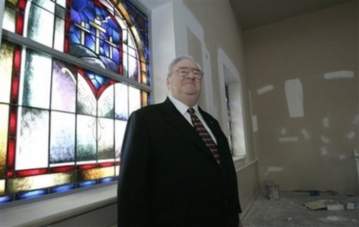 The Rev. Jerry Falwell looks around the inside of an auxiliary sanctuary at the new Thomas Road Baptist Church on the campus of Liberty University in Lynchburg, Va., June 20, 2006.
