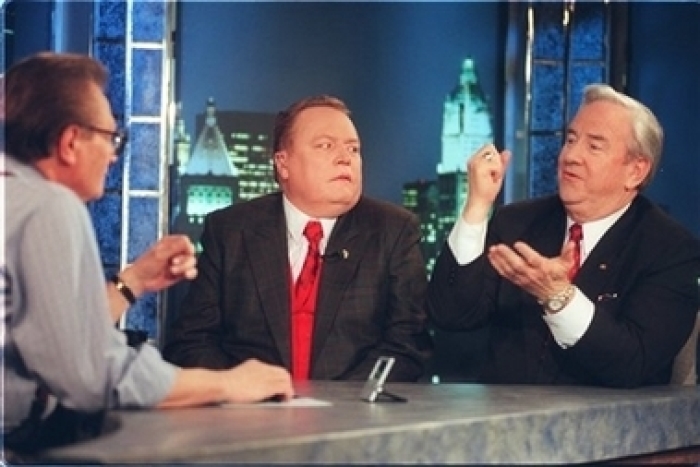 The Rev. Jerry Falwell, right, makes a point while appearing with Hustler publisher Larry Flynt on CNN's Larry King show in this Jan. 10, 1997 file photo in New York. A Liberty University executive says the Rev. Jerry Falwell has died. 