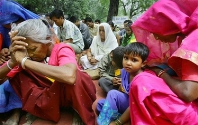 Supporters of All India Christian Council pray during a rally in New Delhi, India, Tuesday, May 29, 2007. The activists demanded protection from violence by right-wing Hindu organizations and safeguarding of their religious rights.