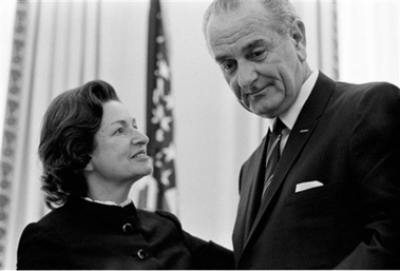 Lady Bird Johnson, left, and President Lyndon B. Johnson are shown during the signing ceremony for the Interior Department Appropriation Bill at the Oval Office at the White House in Washington, D.C., July 26, 1968. Lady Bird died Wednesday, July 11, 2007, at her home in Austin, Texas. 