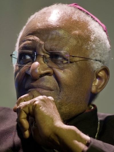 Archbishop Desmond Tutu listens to a speaker at the Millenium Summit in Montreal, Friday, Nov. 9, 2007.