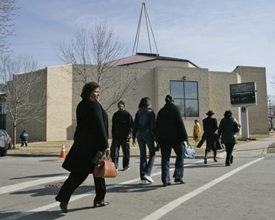 Worshippers arrive for services at Trinity United Church of Christ in Chicago, Sunday, March 11, 2007. 