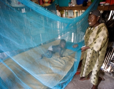 A mother in Lekki, Nigeria, tucks her child beneath an insecticide-treated mosquito net provided by Nothing But Nets. The anti-malaria campaign of The United Methodist Church and its partners raised more than million from 60,000 donors during its first year.