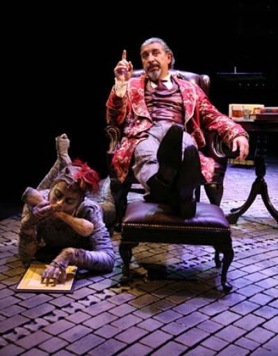 Max McLean as senior devil Screwtape and Karen Eleanor Wight as Toadpipe in the play adapted from C.S. Lewis' The Screwtape Letters.