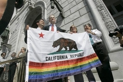 Same sex 'marriage' plaintiff's Stuart Gaffney, left, and his partner John Lewis, second from left, with Myra Beals, second from right, and her partner Ida Matson, right, hold a California flag after hearing the court decision on same sex marriages outside the court house in San Francisco, Calif., on Thursday, May 15, 2008.