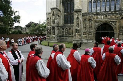 Anglican Bishops from around the world file into the Canterbury Cathedral for their Sunday service, Canterbury, England, Sunday, July 20, 2008. The bishops have turned to the enormous task at the heart of their once-a-decade summit: trying to keep the Anglican family from breaking apart over the Bible and homosexuality. With its private prayer phase over Saturday, the business of the Lambeth Conference begins, but it is hobbled by a boycott: about one-quarter of the invited bishops — mostly theological conservatives from Africa — are not attending.