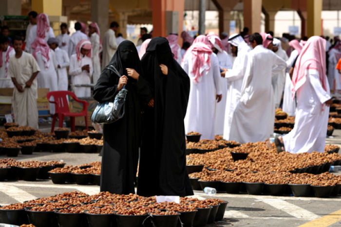 Saudi women at Unayzah market around 400 km north of the capital Riyadh, Saudi Arabia. Saudi Arabia is the birthplace of Islam.