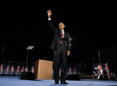 President-elect Barack Obama waves after speaking at the election night rally in Chicago, Tuesday, Nov. 4, 2008.
